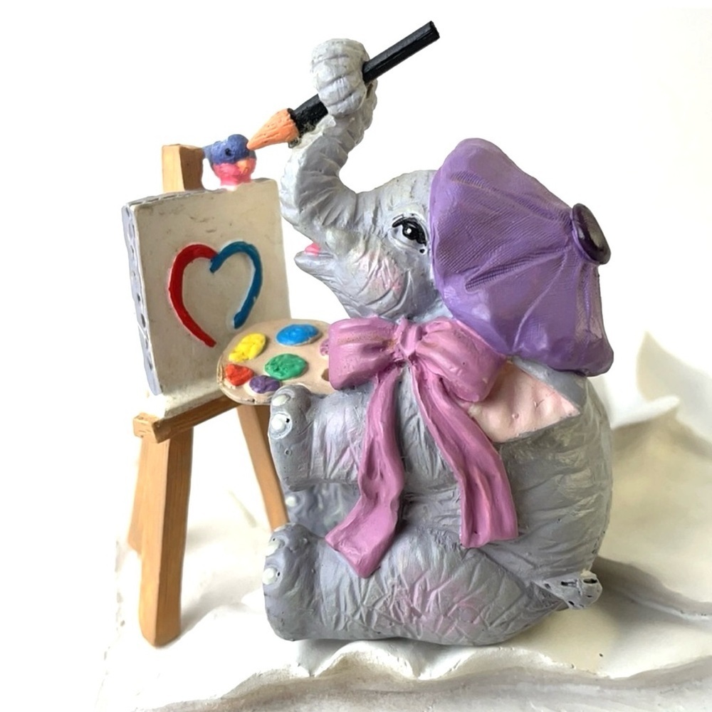 Luckyphants  Elephant Artist Painting Heart Picture on Isle With Tiny Bird